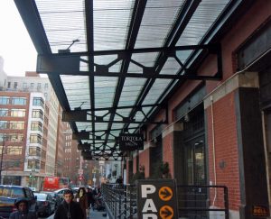 This canopy has been created with salvaged corrugated chicken-wire glass. Since glass is not bio-degradable, this is an excellent use for such an abundant material. 