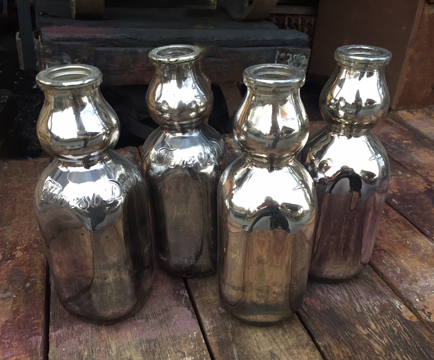 Hand silvered 1950s milk jugs
