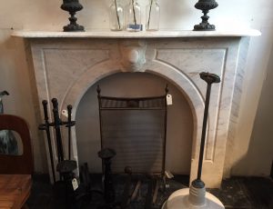 Simple Victorian arched marble mantel from early 1900's