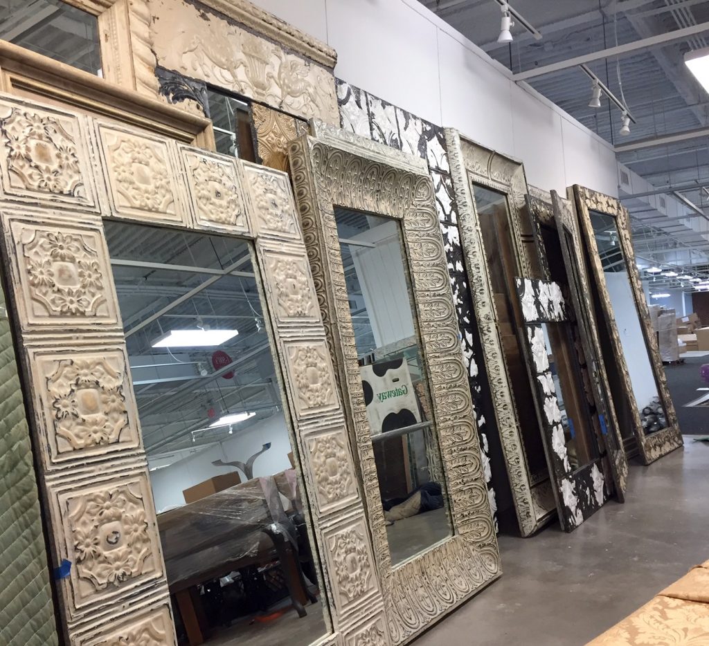 Large selection of full length mirrors being staged at our display at High Point