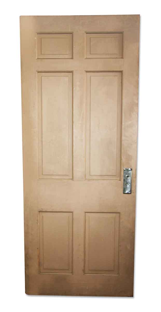 Tan Door with Six Vertical Panels
