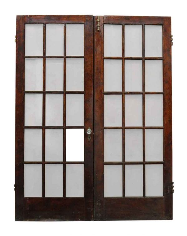 Pair of Eighteen Glass Panel Doors
