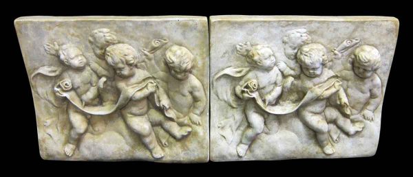 Set of Two Cast Cherub Reliefs in Composite