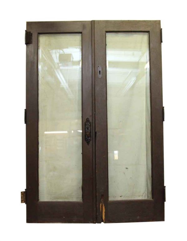 Pair of Dark Wood Doors with Glass Panel