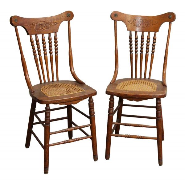 Pair of Carved Wood Chairs with Wicker Seat