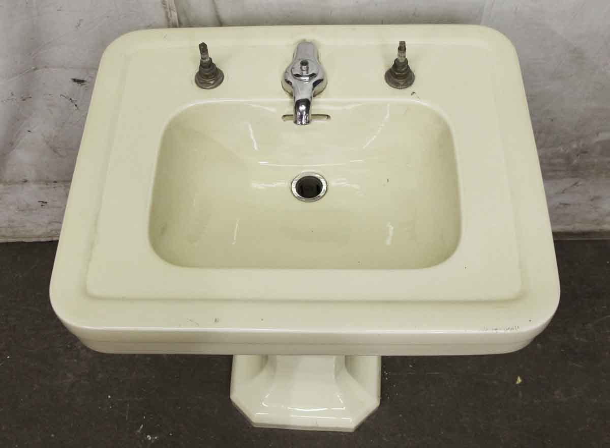 yellow pedestal bathroom sink