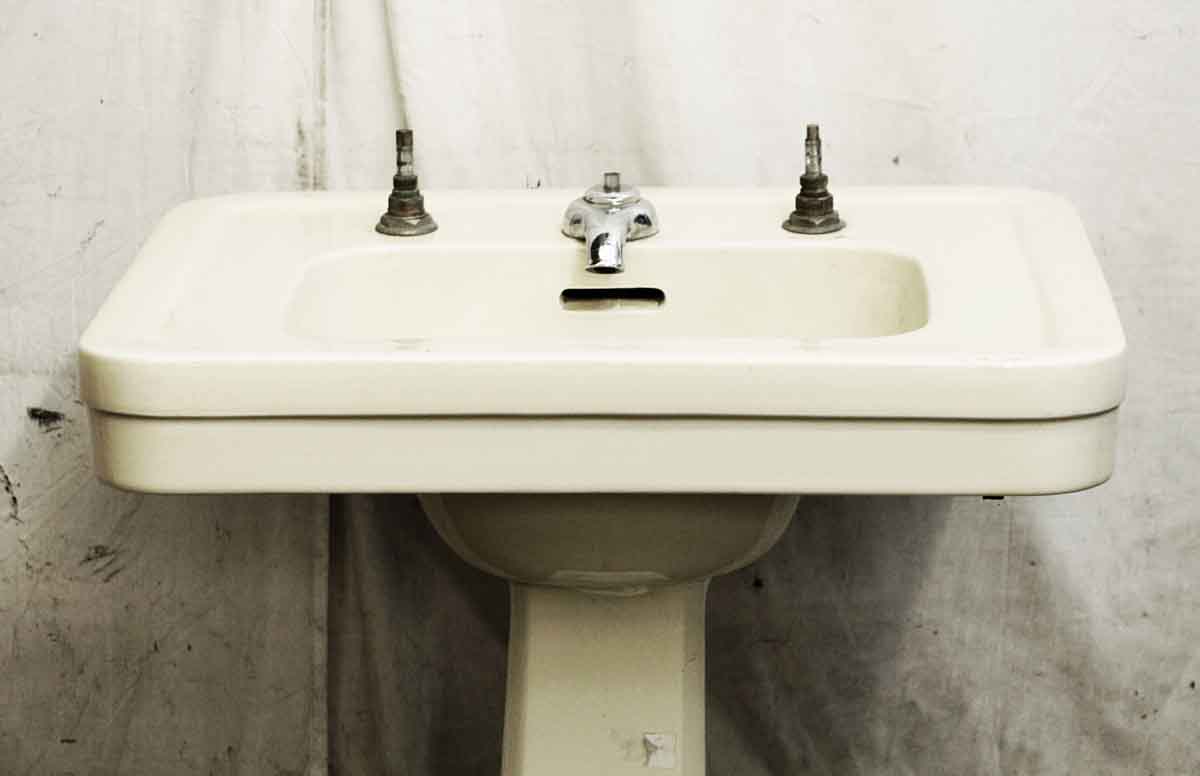 yellow pedestal bathroom sink