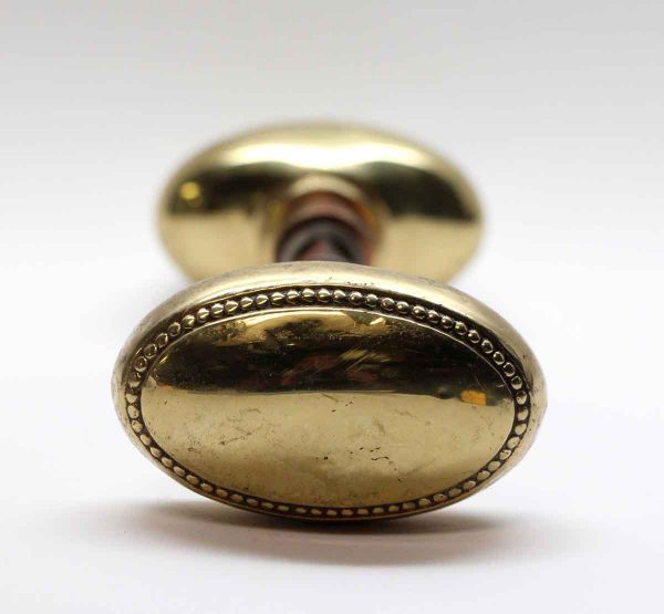 Door Knobs - Polished Brass Russell & Erwin Beaded Oval Door Knob Set