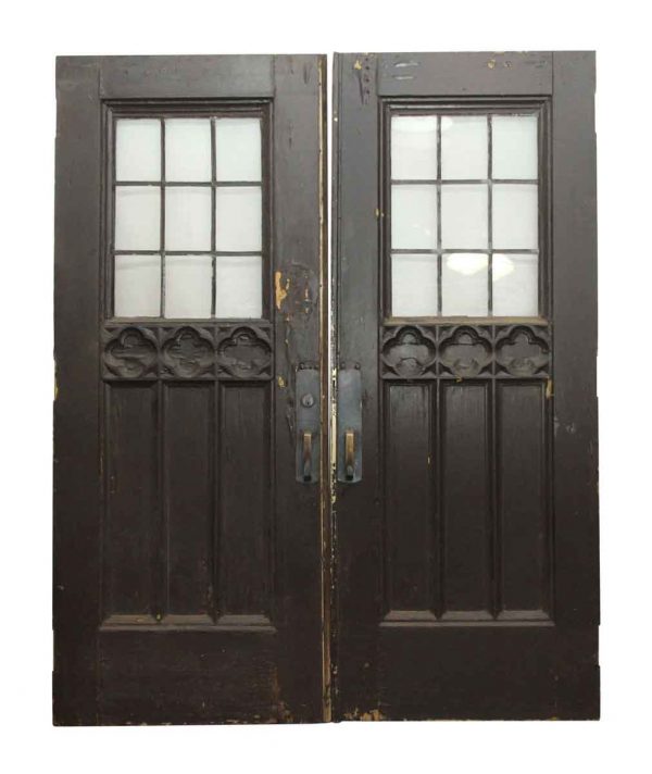 Entry Doors - Double Gothic Tudor Doors with Leaded Glass and Carved Detail