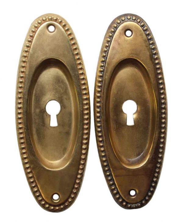 Pocket Door Hardware - Pair of Polished Brass Oval Beaded Pocket Door Plates