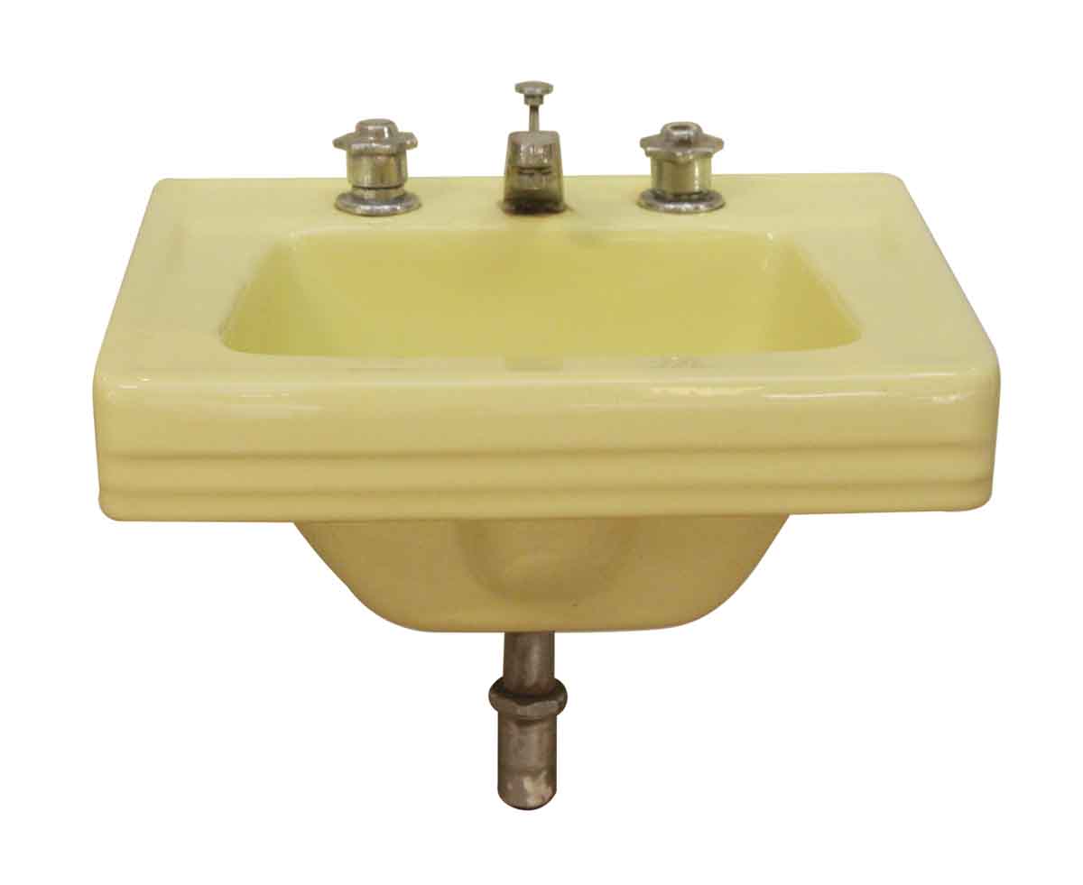 mid century yellow bathroom sink