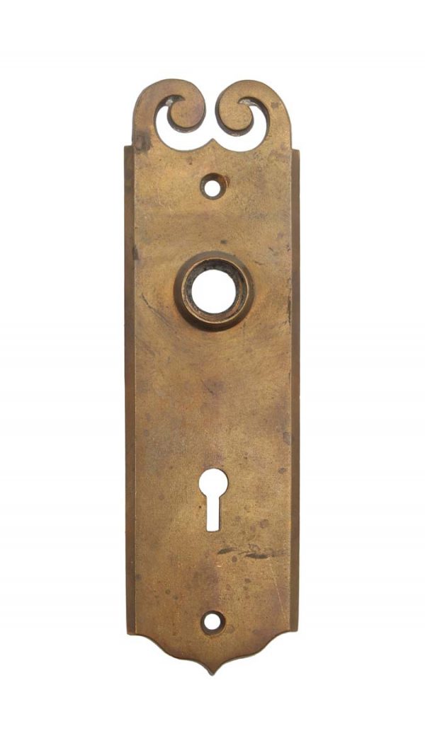 Back Plates - Vintage Traditional Swirl 7.125 in. Keyhole Brass Door Back Plate