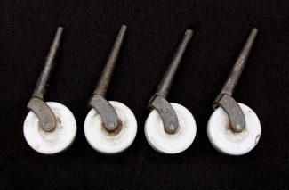 New Old Stock Set of 4 Black Iron Casters with White Porcelain Wheels 