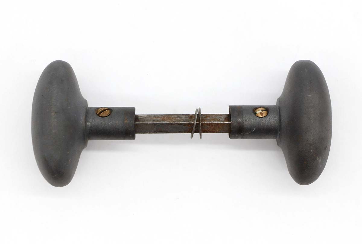 Antique Blackened Cast Iron Pair of Oval Door Knobs