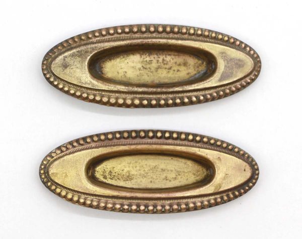 Window Hardware - Pair of Traditional Beaded Pressed Brass Recessed Window Sash Lifts