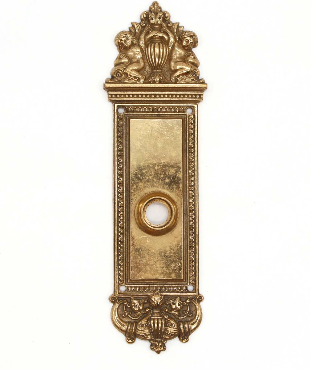 https://ogtstore.com/wp-content/uploads/2023/06/back-plates-late-19th-century-ornamental-cherubic-brass-passage-door-back-plate-q282410.jpg