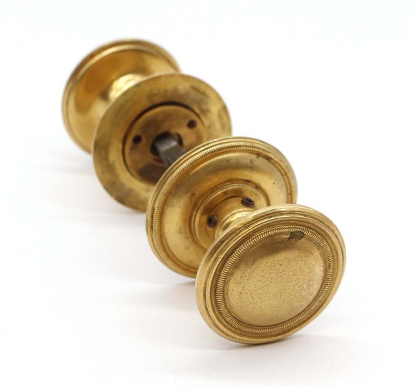 Door Knob Sets - Traditional Round Gilded Cast Brass Concentric Passage Door Knob Set