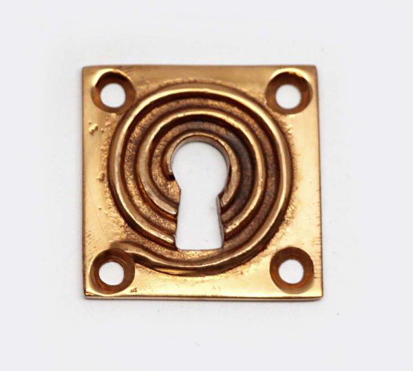 Keyhole Covers - Modern 1.375 in. Square Swirl Brushed Brass Keyhole Cover