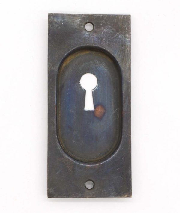 Pocket Door Hardware - Vintage Classic 4.625 in. Darkened Brass Pocket Door Keyhole Plate