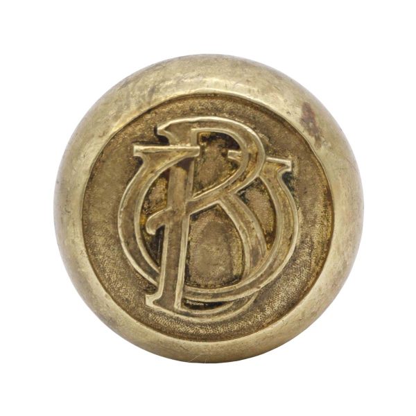 Door Knobs - Antique Cast Brass BU Emblematic Door Knob with Attached Spindle