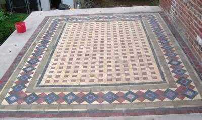 Reclaimed encaustic tile floor in the customer's own design
